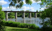 Picture of bridge across a river in summer